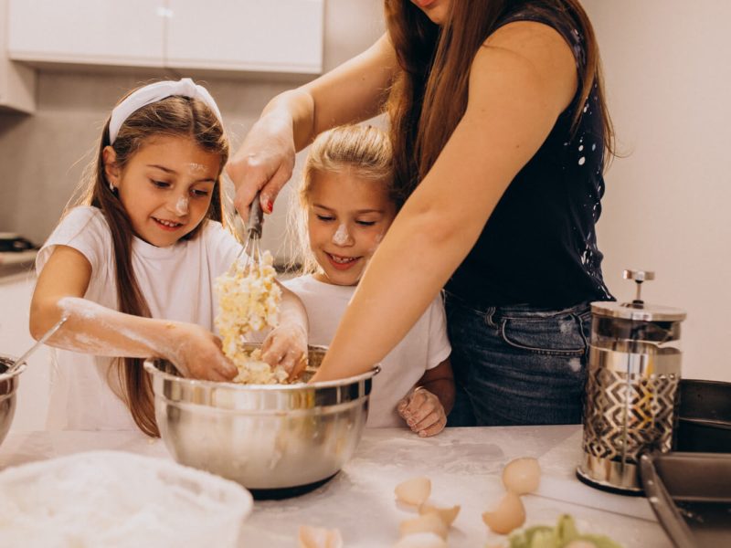 mother-with-two-daughters-kitchen-baking (1)